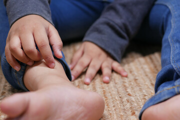  child girl suffering from itching skin, close up.