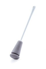 Cropped shot of a plastic gray-white dish sponge with a long handle. The plastic dish sponge is isolated on the white background. Photo for catalog.