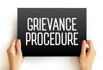Grievance procedure text on card, concept background