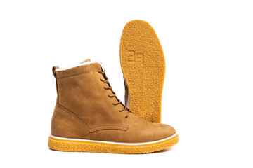 brown leather winter boots with lacing on a white background