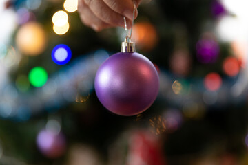 Soon Christmas and New Year, decorating the tree with toys