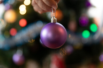 Soon Christmas and New Year, decorating the tree with toys