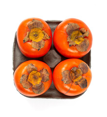 ripe persimons isolated on white background