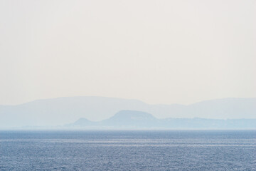 Fototapeta premium rocky coast of greek island and sea view, landscape greece view from boat