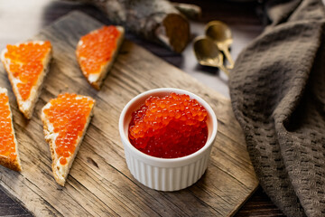 red caviar on a spoon
