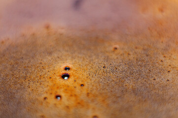 Turkish black coffee. Bubble foam. Soft focus background. Invigorating drink in the morning