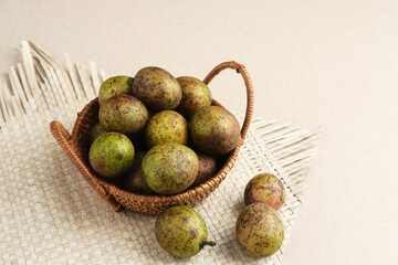 Matoa fruit from Papua, Indonesia. Matoa contains vitamin, nutrients and antioxidant. Selective focus image.
