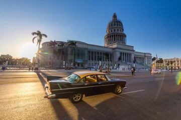 Fotobehang Oldtimer near the Capitol in Havana © Pavel