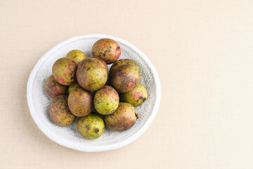 Matoa fruit from Papua, Indonesia. Matoa contains vitamin, nutrients and antioxidant. Selective focus image.
