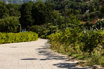 path in the park near island Sveti-Stefan, Budva in Montenegro, Europe, Adriatic Sea and mountains