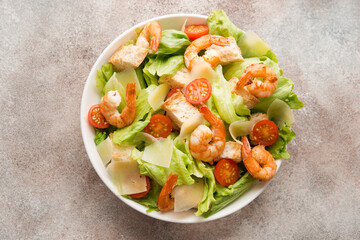 Italian caesar salad with shrimp, croutons and parmesan