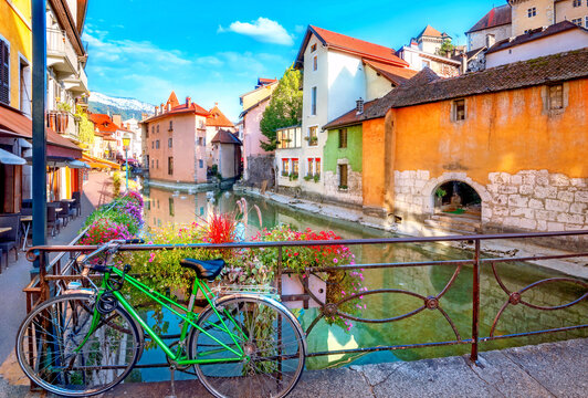 Street view with Canal du Thiou in famous old town Annecy. French Alps, France