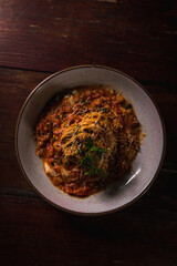 Delicious Pizza Burger Classic Homemade Tomato Sauce Sausage Cheese Onion Chicken Meat Pasta Shrimp Restaurant Menu Gourmet on a wooden table