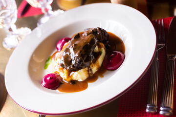 beef cheek with mashed potatoes and currant oil
