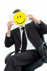 Geschäftsmann mit lachendem Smiley