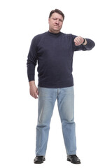 Fototapeta premium full-length. Mature man in jeans and a jumper.