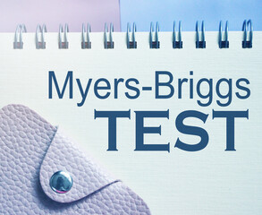 Myers-Briggs test typed on notebook page. Psychological test business concept