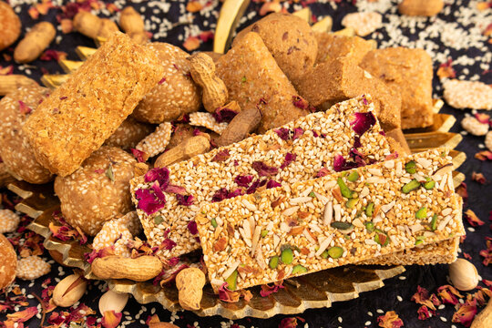 Winter Delicacy Makar Sankranti Or Lohri Mithai Gulab Gajak, Pista Gazak, Til Patti Or Papdi, Til Laddu Or Ladoo, Revdi And Rewri Is Made Of Tilgul, Mungfali, Sesame Seed, Jaggery Gud, Badam And Pista