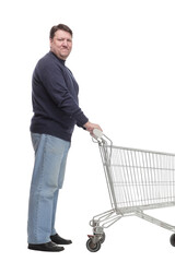 in full growth. casual mature man with shopping cart .