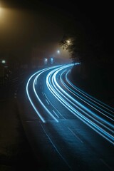 Fototapeta na wymiar Light Trails Nebel Nacht Autos