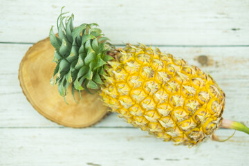 A whole large fresh ripe fruit pineapple