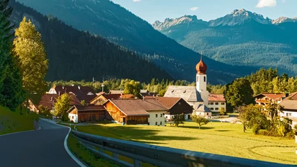 Foto op Canvas Beautiful alpine summer morning view with a church at Stanzach, Tyrol, Austria © Martin Erdniss
