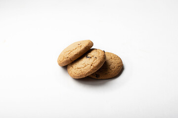 Oatmeal cookies on a white background for insulation. Oatmeal cookies with raisins