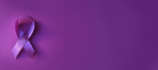 International Epilepsy Day. Purple ribbon on purple background. Alzheimer's disease, Pancreatic...