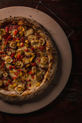 Delicious Pizza Burger Classic Homemade Tomato Sauce Sausage Cheese Onion Chicken Meat Pasta Shrimp Restaurant Menu Gourmet on a wooden table
