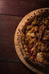 Delicious Pizza Burger Classic Homemade Tomato Sauce Sausage Cheese Onion Chicken Meat Pasta Shrimp Restaurant Menu Gourmet on a wooden table