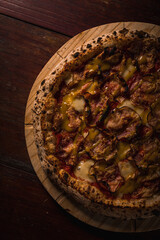 Delicious Pizza Burger Classic Homemade Tomato Sauce Sausage Cheese Onion Chicken Meat Pasta Shrimp Restaurant Menu Gourmet on a wooden table