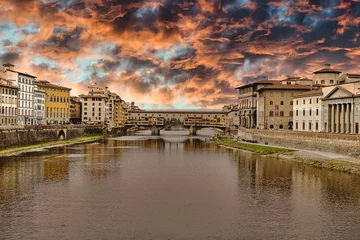 Wall murals Ponte Vecchio sunset in the town of florence with bridge