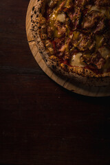 Delicious Pizza Burger Classic Homemade Tomato Sauce Sausage Cheese Onion Chicken Meat Pasta Shrimp Restaurant Menu Gourmet on a wooden table