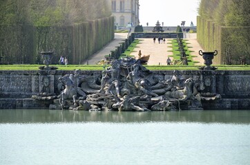 Neptune Fountain in gardens of famous Versailles palace, Paris