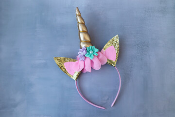 Hoop multicolored children's unicorn with ears