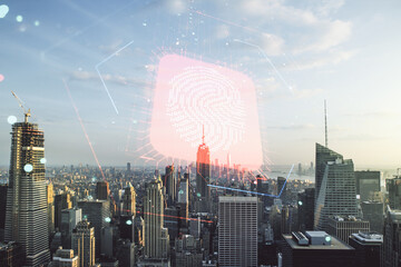 Multi exposure of virtual fingerprint scan interface on Manhattan office buildings background, digital access concept