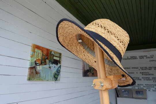 Straw hat on the veranda in the museum "Dacha of the artist Konstantin Korovin" in the village of Okhotino, Yaroslavl region