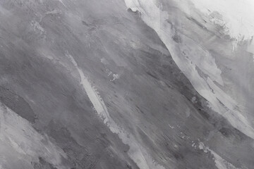 Designer plaster in gray white and dark gradient shades. Imitation of marble