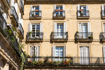 Bilbao New Square small balconies residential building facade in old town city. Real estate...