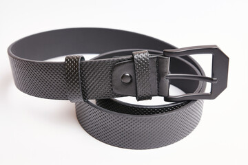 Big black leather belt with black metal buckle.