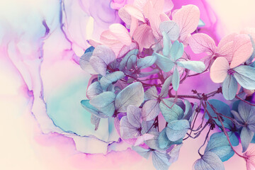 Creative image of pink and turquoise Hydrangea flowers on artistic ink background. Top view with copy space