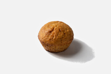 Carrot sweet muffin. Carrot cake with sugar and cinnamon on a white background for insulation