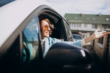 Young woman travelling by electro car