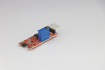 Linear hall effect sensor module for arduino and other microcontroller board projects on white background - obrazy, fototapety, plakaty