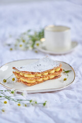 Puff pastry cake Napoleon layers closeup texture. Millefeuille . Restaurant menu concept