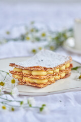 Puff pastry cake Napoleon layers closeup texture. Millefeuille . Restaurant menu concept