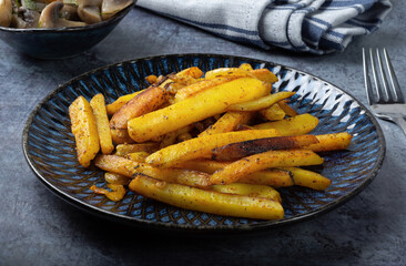 Fried potatoes with onions. Rustic potatoes with onions. traditional russian food