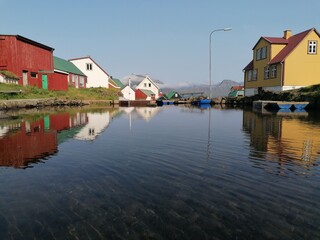Fototapeta premium The cute and cozy old historical houses of the Faroe Islands with grass on the roof
