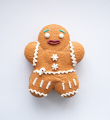 Scared Gingerbread Man on white background