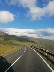 A beautiful mountain road and path leading into the horizon